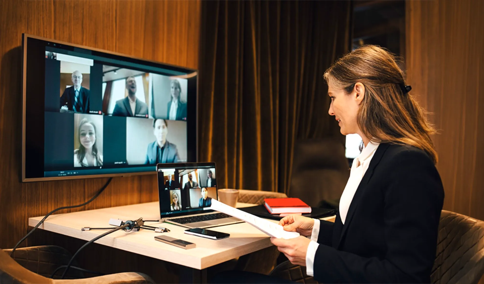 Businesswoman connecting with her team during a video call.