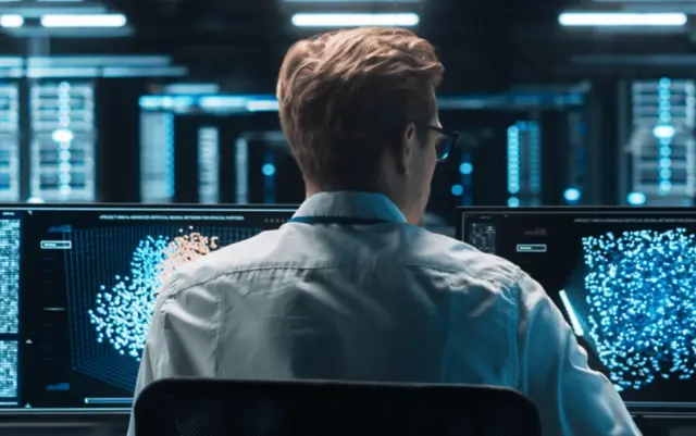 IT professional focused on computer work in a data center.
