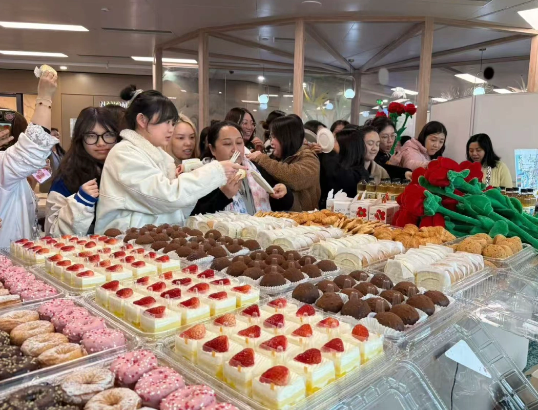 TP team enjoys a delightful dessert feast, sharing sweet treats and joyful moments together